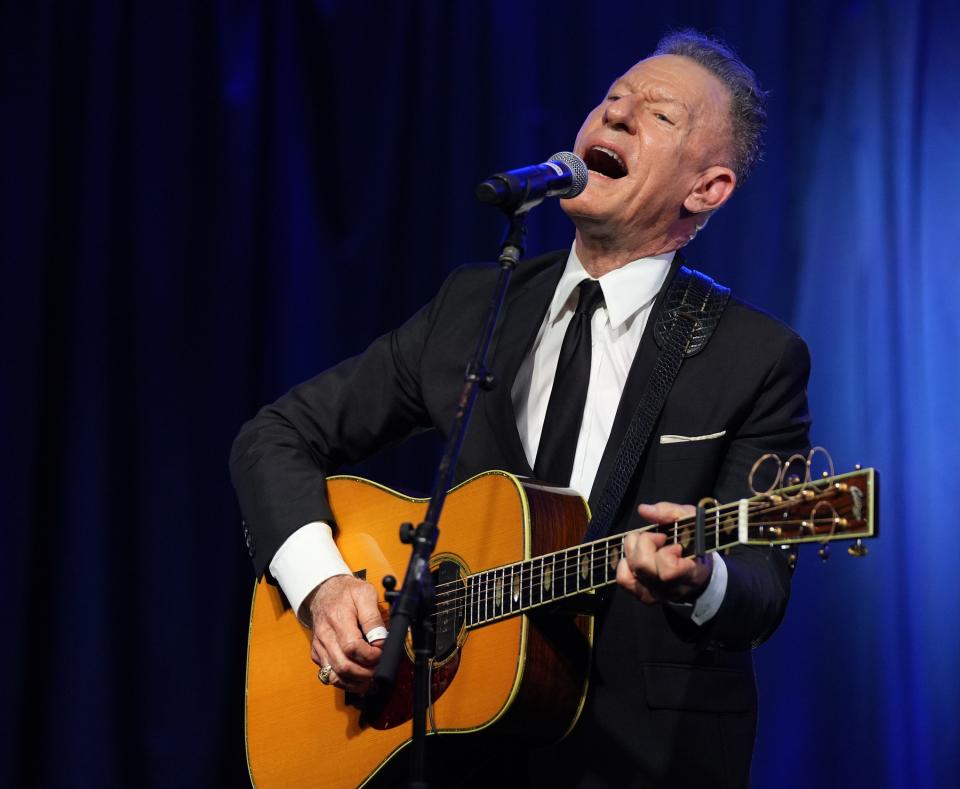 Lyle Lovett performs at a gala where Willie Nelson received the LBJ Liberty and Justice For All Award at the LBJ Presidential Library. The proceeds from the gala will benefit the newly established Willie Nelson Endowment for Uplifting Rural Communities.