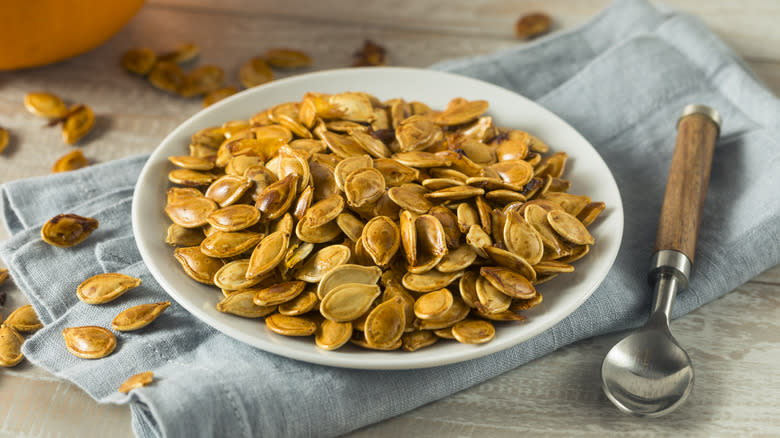 roasted pumpkin seeds in bowl 