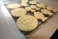 Sugar cookies with the likeness of President Obama are displayed as part of Julie Muller's cookie decorating kits which she sell on Etsy, Tuesday, Sept. 22, 2020, in Houston. One of the cookie-decorating kits she offers has a Black Lives Matter theme. Amid all the Black Lives Matter themed T-shirts, face masks and signs appearing in recent months, some unconventional merchandise has been popping up on online crafts marketplace Etsy. (AP Photo/David J. Phillip)