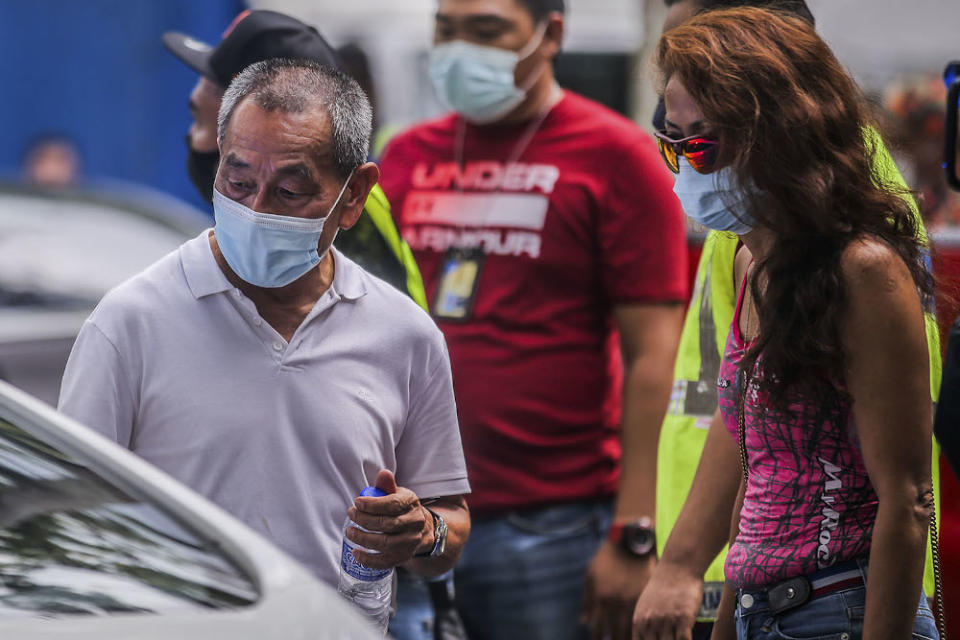 The two passengers who survived were former Malaysia Airlines Berhad CEO Datuk Ahmad Jauhari Yahya (left) and Tan Chai Eian (right), seen after the helicopter crash in Melawati November 8, 2020. — Picture by Hari Anggara