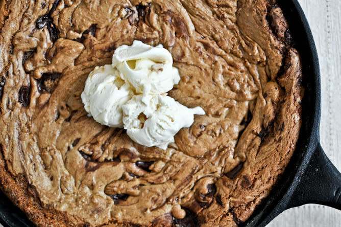<strong>Get the <a href="http://www.howsweeteats.com/2012/06/dark-chocolate-chunk-skillet-cookie/" target="_blank">Dark Chocolate Chip Skillet Cookie Recipe</a> from <a href="http://tastykitchen.com/blog/2012/05/dark-chocolate-chunk-skillet-cookie/" target="_blank">Tasty Kitchen</a>, via How Sweet It Is</strong>