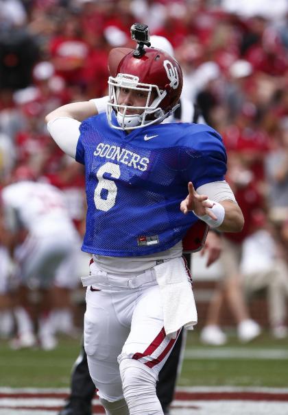 Oklahoma quarterback Baker Mayfield (6) throws a pass during their annual spring NCAA college football game in Norman, Okla., Saturday, April 12, 2014. (AP Photo/Alonzo Adams)