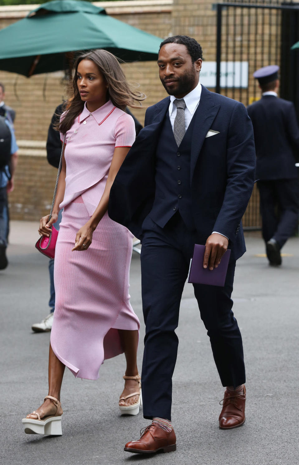 <p>The actor and his model girlfriend enjoyed a courtside date at Wimbledon on day 12 of the championships. <i>[Photo: Rex]</i></p>