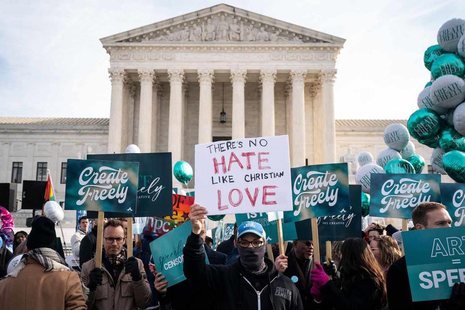 <p>Kent Nishimura / Los Angeles Times via Getty Images</p> Protestors for and against the right to LGBTQ+ discrimination gather outside the Supreme Court in Dec. 2022 as justices hear oral arguments in 