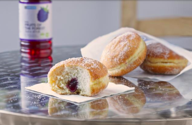 The bakery chain's classic jam doughnut contains more than 50 calories more [Image: Getty]