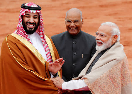 Saudi Arabia's Crown Prince Mohammed bin Salman is greeted by India's Prime Minister Narendra Modi and President Ram Nath Kovind during his ceremonial reception at the forecourt of Rashtrapati Bhavan in New Delhi, India, February 20, 2019. REUTERS/Adnan Abidi TPX IMAGES OF THE DAY