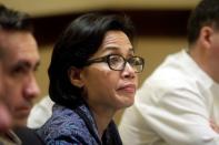 World Bank's Managing Director and Chief Operating Officer Sri Mulyani Indrawati listens to a question from a journalist during a news conference in Managua, July 10, 2014. REUTERS/Oswaldo Rivas