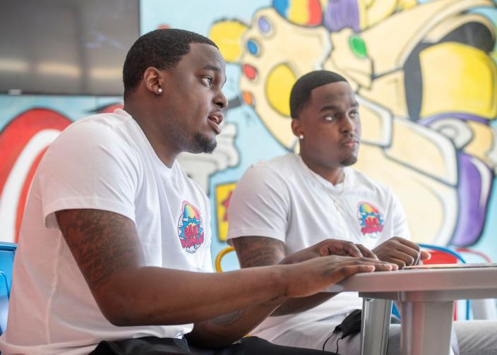 Twin brothers and co-owners Jamal Sharp, left, and Jamari Sharp talk about their BAM! Snoballs business in Pensacola on March 10, 2021. The Sharps are among the business owners who applied for a business development grant through the Bantucola, a platform intended to promote Black-owned businesses in Northwest Florida.