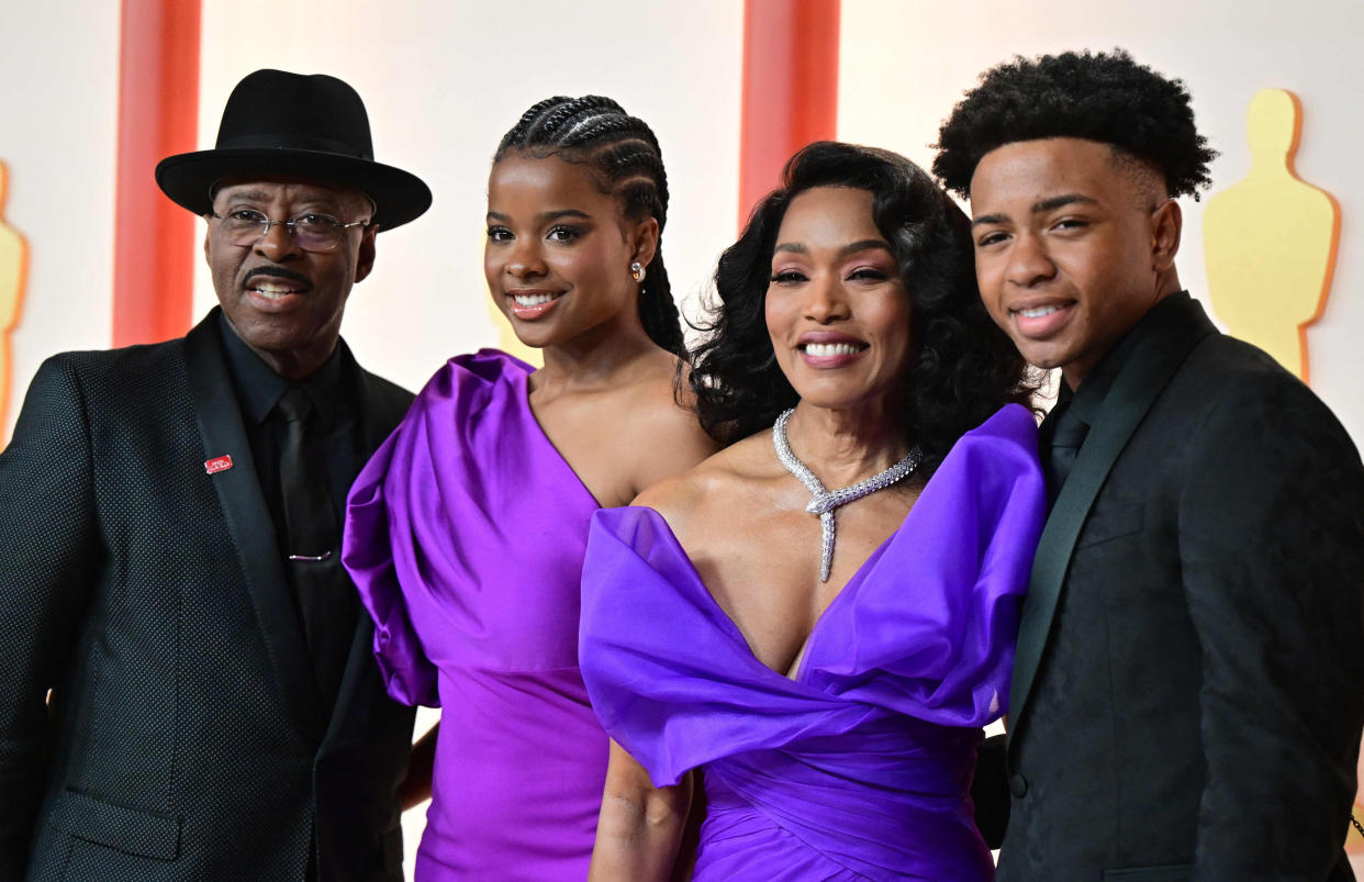 US actress Angela Bassett (2R), her husband actor Courtney B. Vance (L) and their children Bronwyn Golden Vance (2L) and Slater Josiah Vance  (Frederic J. Brown / AFP - Getty Images)