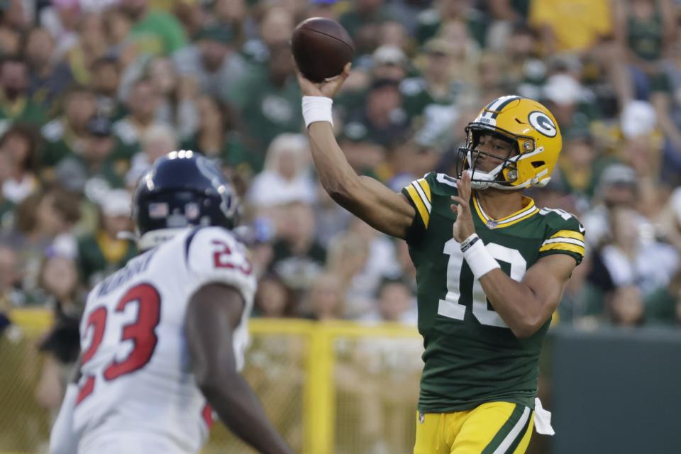 Green Bay Packers' Jordan Love throws during the first half of a preseason NFL football game against the Houston Texans Saturday, Aug. 14, 2021, in Green Bay, Wis. (AP Photo/Mike Roemer)