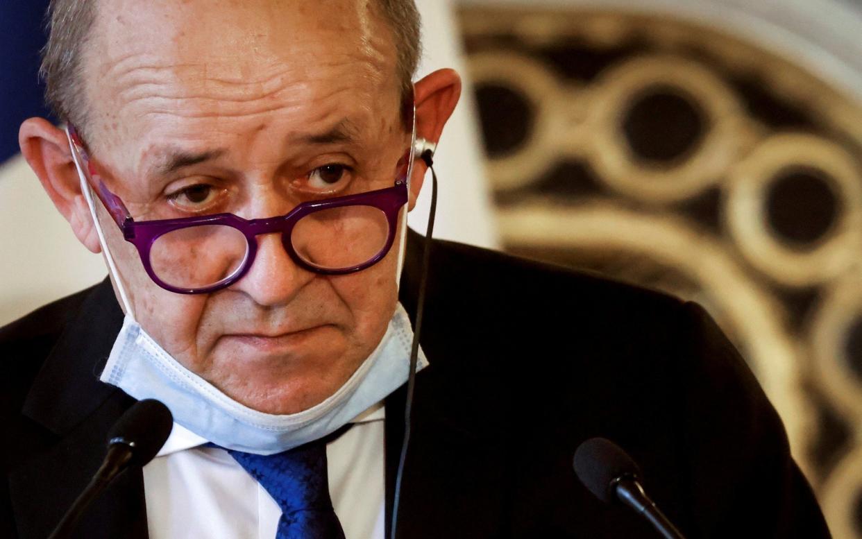 Mr Le Drian told French radio that no AstraZeneca exports from the EU would be allowed until the firm caught up with delivery shortfalls -  Ludovic Marin/Pool via Reuters