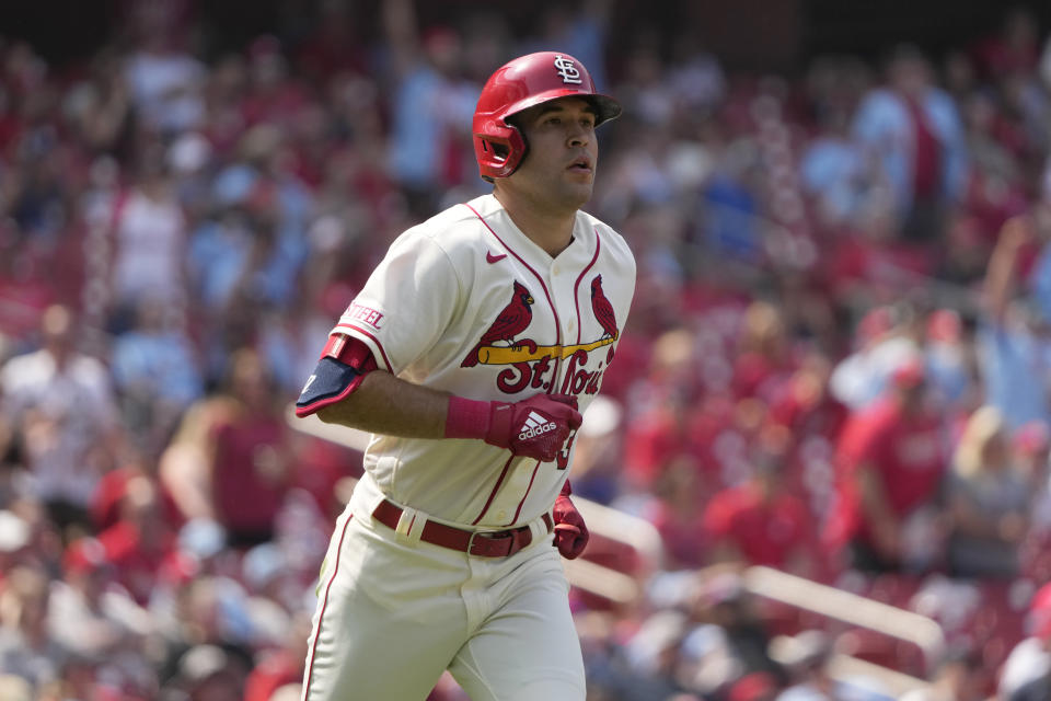 St. Louis Cardinals' Dylan Carlson watches his two-run home run during the eighth inning of a baseball game against the Cincinnati Reds Saturday, June 10, 2023, in St. Louis. (AP Photo/Jeff Roberson)