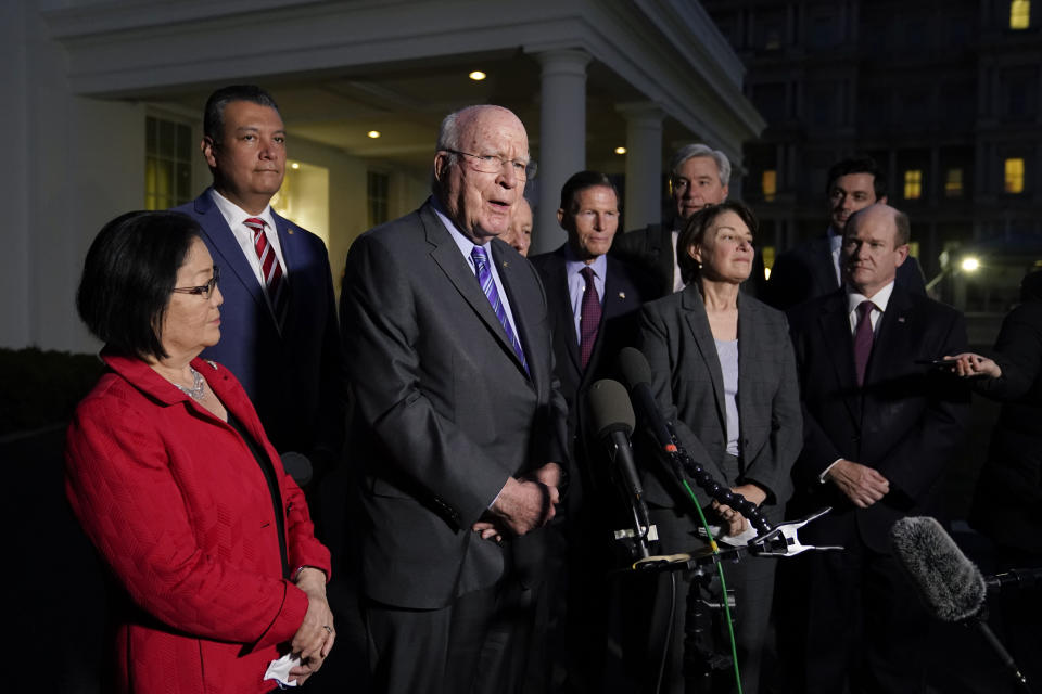 Sen. Patrick Leahy, D-Vt., center, speaks with reporters after he and Democratic members of the Senate Judiciary Committee met with President Joe Biden to discuss the upcoming Supreme Court vacancy, Thursday, Feb. 10, 2022, at the White House in Washington. Standing with Leahy are Sen. Mazie Hirono, D-Hawaii, from left, Sen. Alex Padilla, D-Calif., Sen. Richard Blumenthal, D-Conn., Sen. Amy Klobuchar, D-Minn., Sen. Sheldon Whitehouse, D-R.I., Sen. Chris Coons, D-Del., and Sen. Jon Ossoff, D-Ga. (AP Photo/Patrick Semansky)