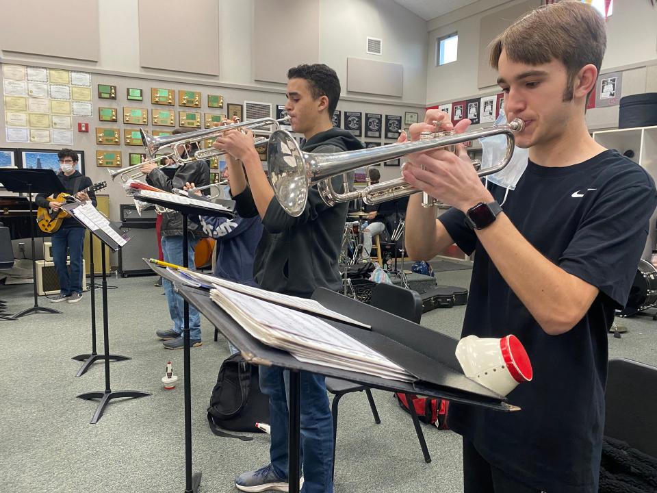 Members of the Foothill High School jazz band practice for Club Cougar on Monday.