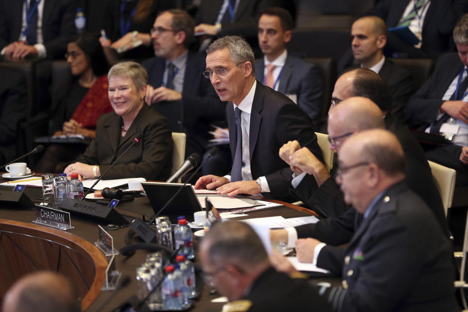 NATO Secretary General Jens Stoltenberg, center, chairs a round table meeting of the North Atlantic Council with Georgia and Ukraine at NATO headquarters in Brussels, Tuesday, Dec. 4, 2018. (AP Photo/Francisco Seco)