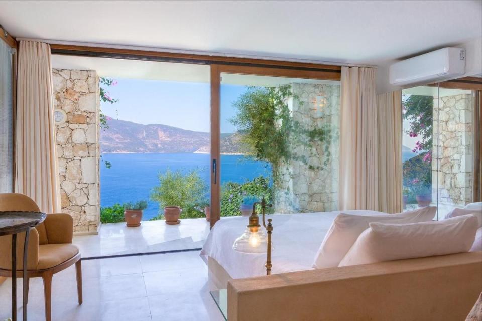 <p>A couple of hours by car south of the airport in Dalaman, Villa Mahal is on a hillside at the edge of the Mediterranean, with grounds that are planted with olive, lime and fig trees. <br><br>Guests can make the most of the seaside setting by chartering the villa’s yacht for sails around the Turkish Riviera’s Lycian coast, with stops for spectacular swims at the sunken city of Aperlae or at neighbouring Greek islands. The town of Kalkan is just across the bay and a 10-minute drive away.<br></p><p><a class="link " href="https://www.booking.com/hotel/tr/villa-mahal.en-gb.html?aid=2070929&label=best-hotels-turkey" rel="nofollow noopener" target="_blank" data-ylk="slk:CHECK AVAILABILITY">CHECK AVAILABILITY</a></p>