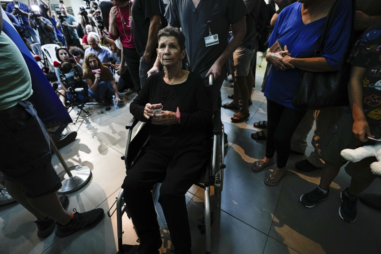 Yocheved Lifshitz, 85, who was held hostage in Gaza after being abducted during Hamas' bloody Oct. 7 attack on Israel, speaks to members of the press a day after being released by Hamas militants, at Ichilov Hospital in Tel Aviv, Israel, Tuesday, Oct. 24, 2023. (AP Photo/Ariel Schalit)