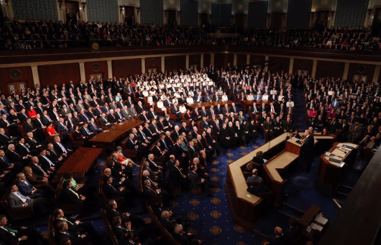 The democratic women of the House sat together and formed an entire section of white. (Photo: Reuters)