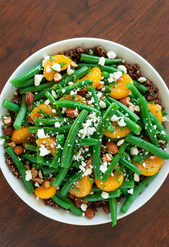 <p>Peas & Crayons</p><p>This Green Bean and Quinoa Salad with Maple Citrus Dressing is totally crave-worthy and can easily be made in advance for a tasty holiday side dish that’s sure to impress! <a href="http://peasandcrayons.com/2015/11/green-bean-and-quinoa-salad-with-maple-citrus-dressing.html" rel="nofollow noopener" target="_blank" data-ylk="slk:Get the recipe here.;elm:context_link;itc:0;sec:content-canvas" class="link rapid-noclick-resp">Get the recipe here.</a></p><p><strong>Related: <a href="https://parade.com/950107/mayakrampf/best-low-carb-keto-thanksgiving-recipes/" rel="nofollow noopener" target="_blank" data-ylk="slk:18 Low-Carb and Keto Thanksgiving Recipes;elm:context_link;itc:0;sec:content-canvas" class="link rapid-noclick-resp">18 Low-Carb and Keto Thanksgiving Recipes</a></strong></p>