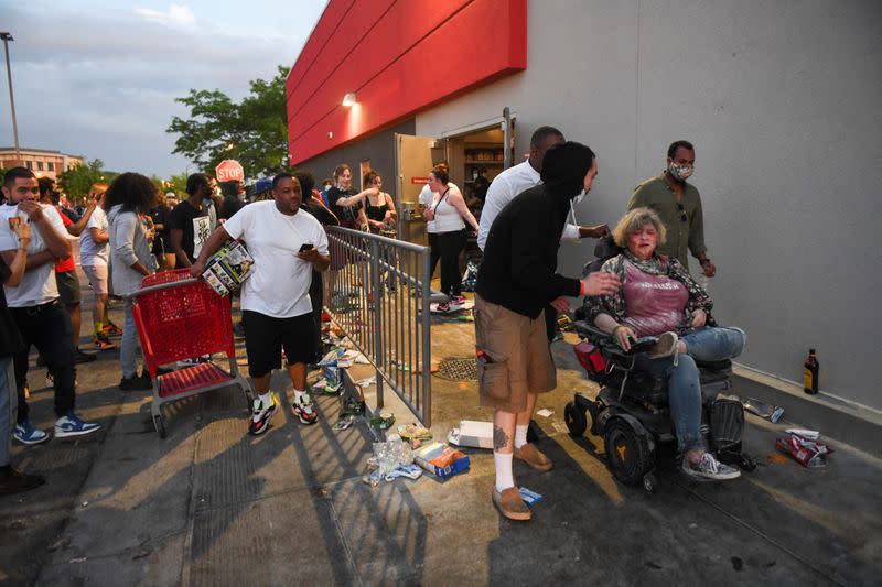 Protesters gather near the Minneapolis Police third precinct