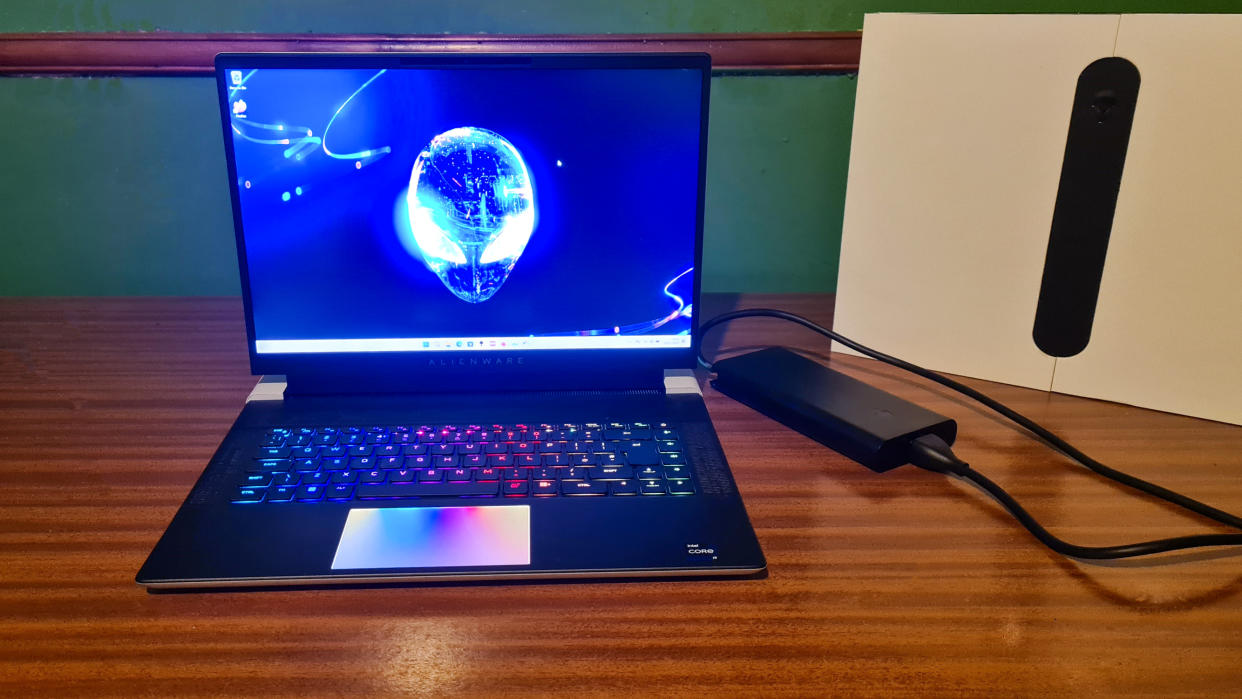  Alienware x16 on a wooden desk 