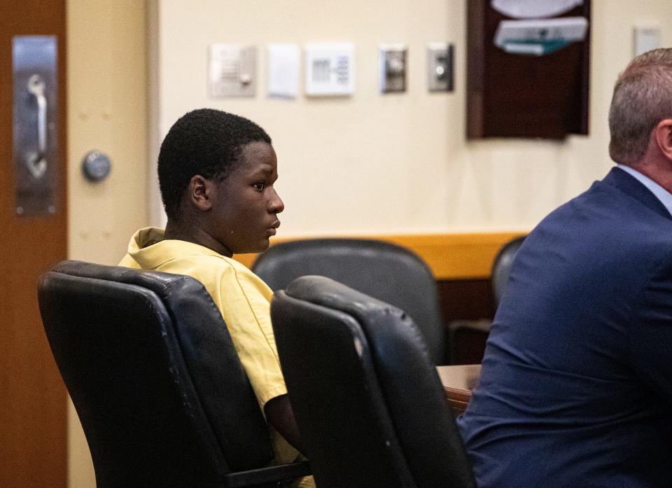 Christopher Horne, 16, enters a Lee County courtroom during a pretrial detention motion on Thursday, May 9, 2024. He has been arrested in connection with the murder of Kayla Rincon-Miller, 15,. Lee County Judge Nicholas Thompson ruled that he will be held without bond after testimony from a Cape Coral detective.