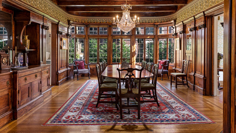 A dining room inlaid with rich mahogany panels.