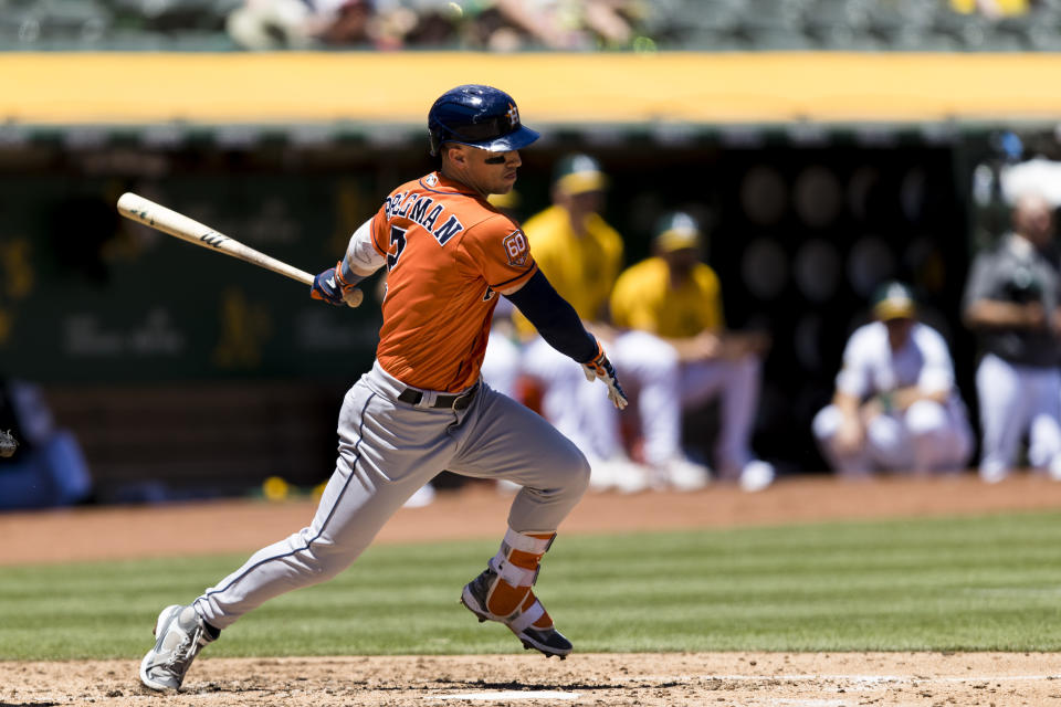 Houston Astros' Alex Bregman hits a single against the Oakland Athletics during the third inning of a baseball game in Oakland, Calif., Wednesday, June 1, 2022. (AP Photo/John Hefti)