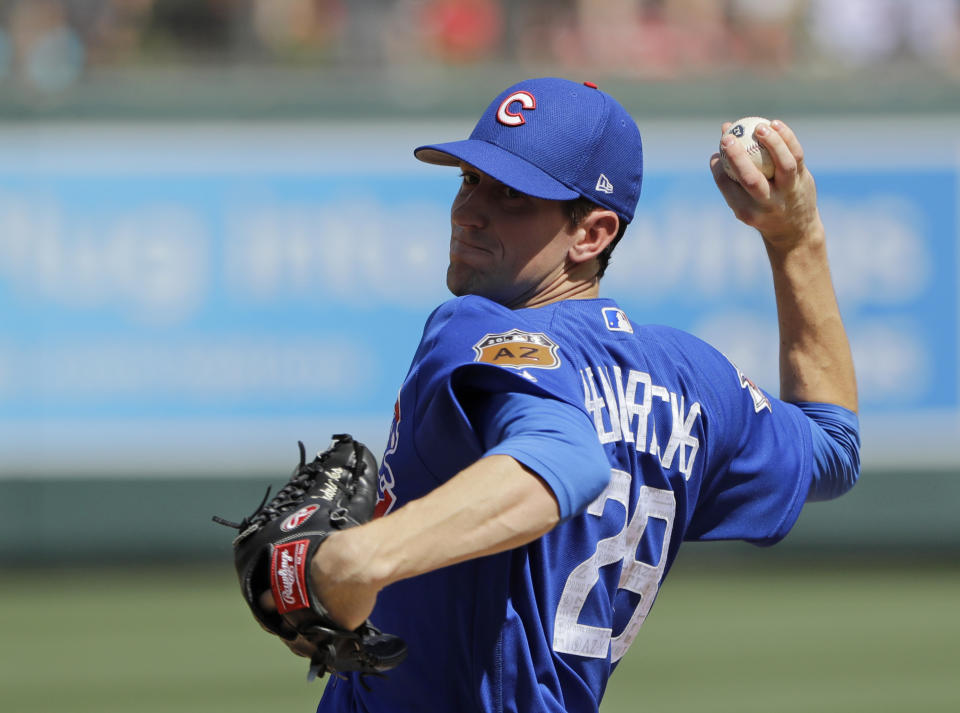 Chicago Cubs' Kyle Hendricks throws during the first inning of the team's spring training baseball game against the Colorado Rockies, Monday, March 20, 2017, in Scottsdale, Ariz. (AP Photo/Darron Cummings)