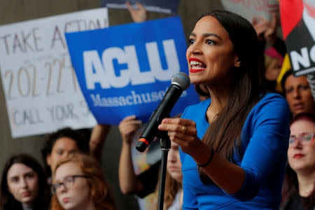FILE PHOTO: Democratic Congressional candidate Alexandria Ocasio-Cortez speaks at a rally against Supreme Court nominee Brett Kavanaugh outside an expected speech by U.S. Representative Jeff Flake (R-AZ) in Boston, Massachusettes, U.S., October 1, 2018. REUTERS/Brian Snyder/File Photo