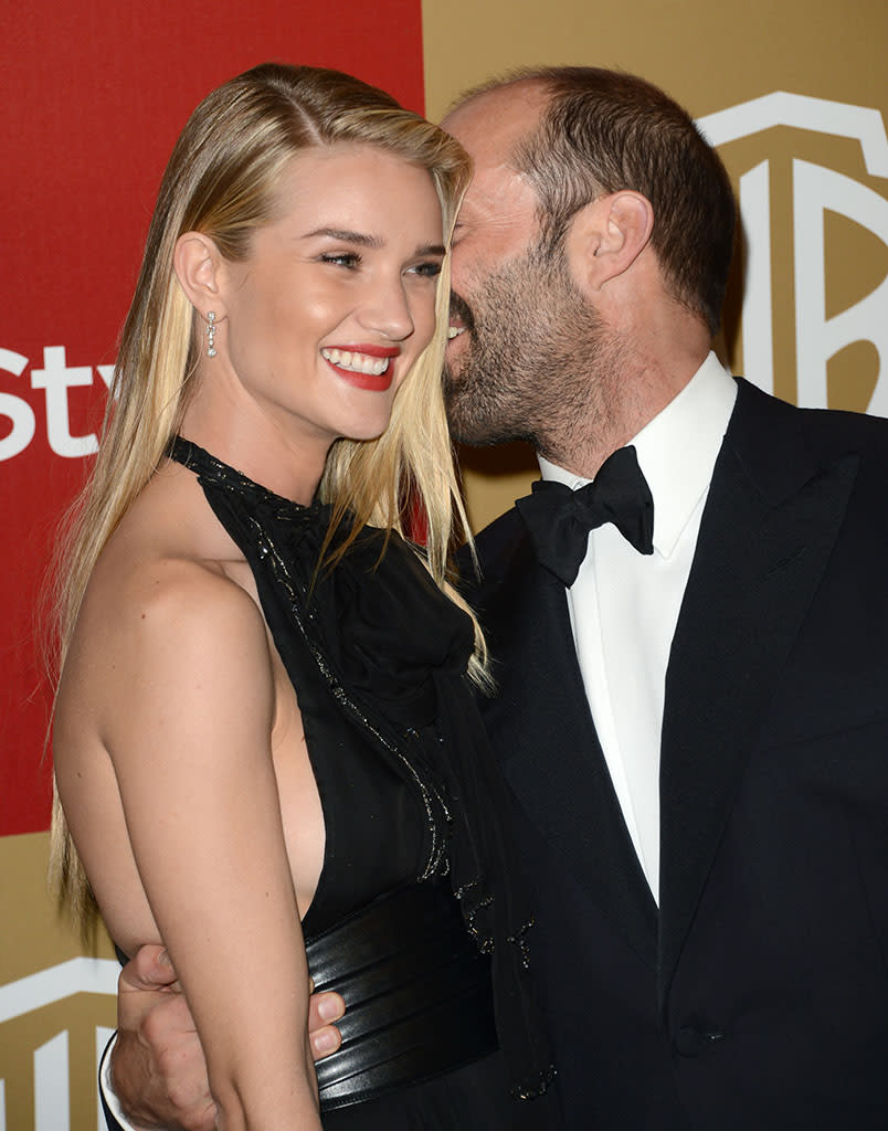 Rosie Huntington-Whiteley and Jason Statham attend the 14th Annual Warner Bros. And InStyle Golden Globe Awards After Party held at the Oasis Courtyard at the Beverly Hilton Hotel on January 13, 2013 in Beverly Hills, California.