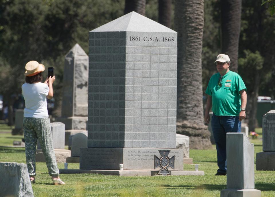 This August 17, 2017, file photo shows a Confederate monument at Santa Ana Cemetery in Santa Ana, Calif. Relying on hard data, a team of scholars showed a mathematical correlation between elite Confederate settlers and Confederate monuments, lynchings, sundown towns, and racial segregation in the West.