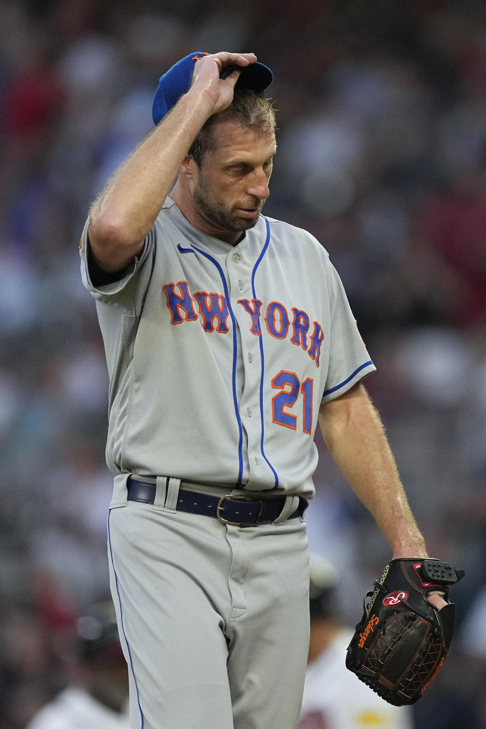 New York Mets starting pitcher Max Scherzer (21) paces on the mound after the Atlanta Braves scored a run in the fourth inning of a baseball game, Wednesday, June 7, 2023, in Atlanta. (AP Photo/John Bazemore)