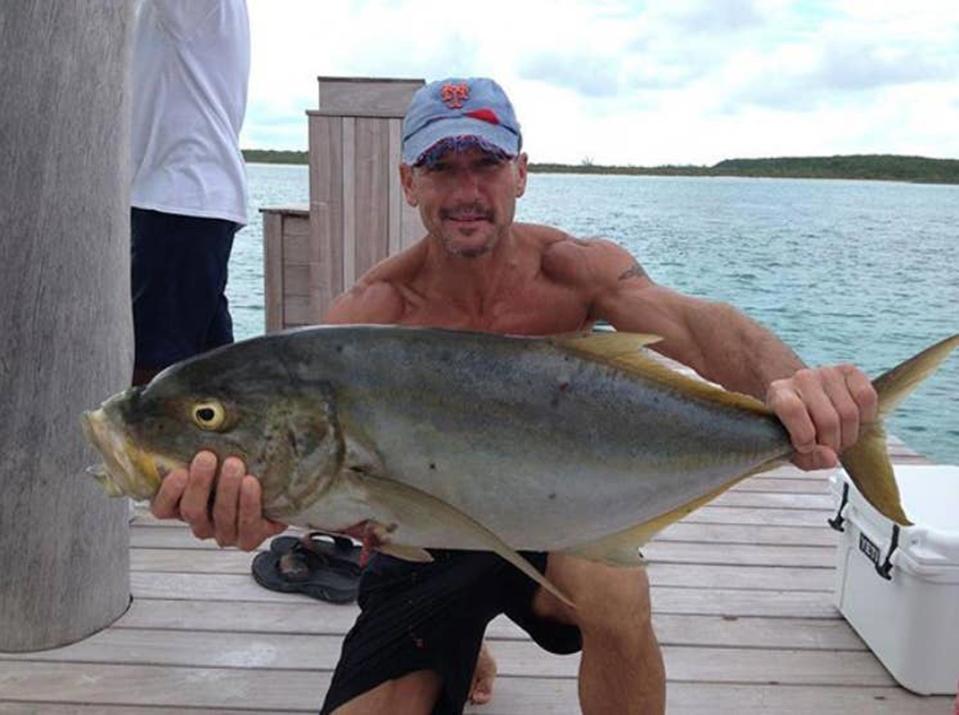 The dad of three has more photos of himself showing off his catch of the day than a boy on a dating profile. 