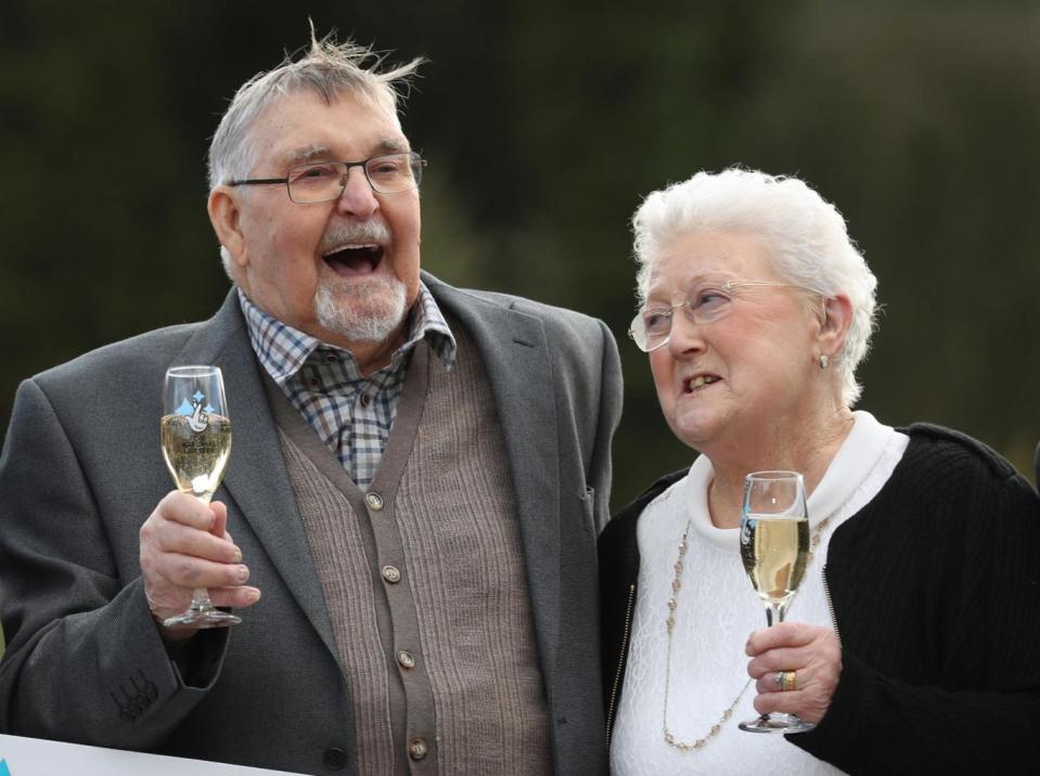 Dennis Banfield and his wife Shirley celebrate at Tortworth Court in Gloucestershire (PA)