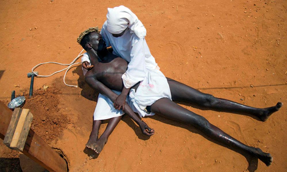 Actors perform the roles of Jesus Christ and virgin Mary during the Good Friday procession ahead of Easter in Juba, South Sudan on April 14, 2017. Christian Believers around the world mark the Holy Week of Easter in celebration of the crucifixion and resurrection of Jesus Christ. / AFP PHOTO / ALBERT GONZALEZ FARRANALBERT GONZALEZ FARRAN/AFP/Getty Images