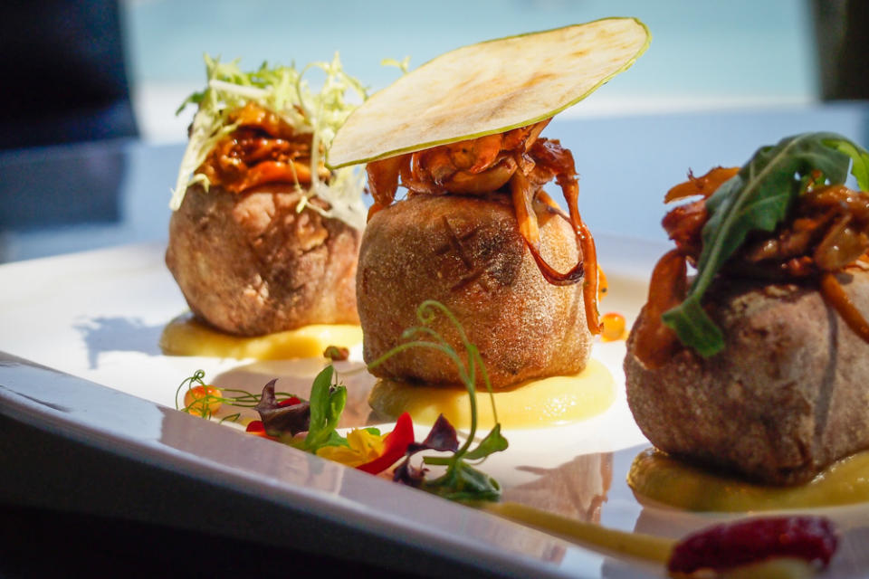 Orange mushrooms and sliced apple on pork leg cubes (HKD$218). Photo by writer.