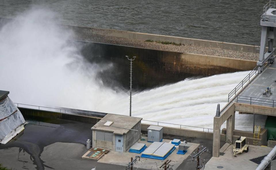 Water is released from the base of Friant Dam in excess of 8,000 cubic feet per second on Tuesday, April 11, 2023 to make room in Millerton Lake for the massive snow pack in the Sierra Nevada that will continue to melt in the coming weeks and months.