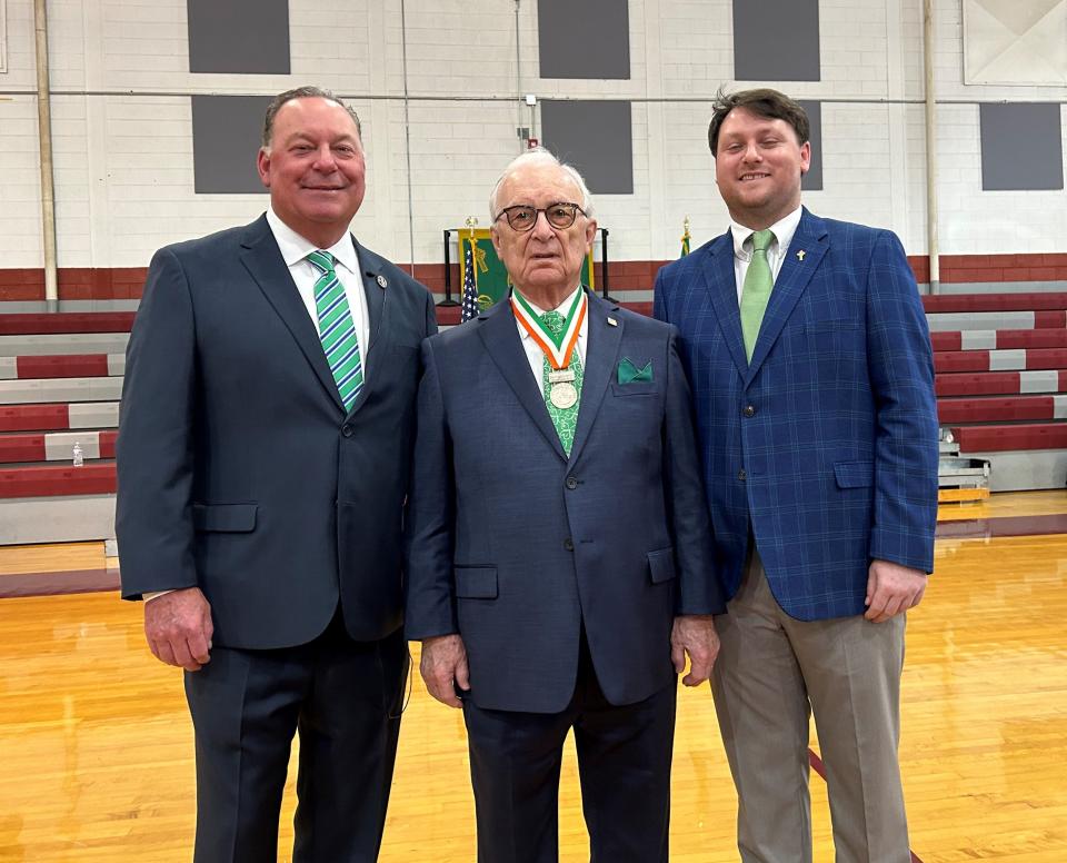 2024 Grand Marshal for Savannah's St. Patrick's Day parade, John Forbes (left) poses with his father, Jim Forbes, and son, Conor Forbes during the Grand Marshal announcement on Sunday at Benedictine Military School.