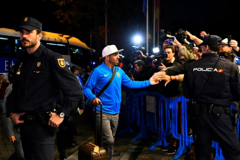 Carlos Tevez arrived in Madrid with the rest of his Boca Juniors team-mates on Wednesday