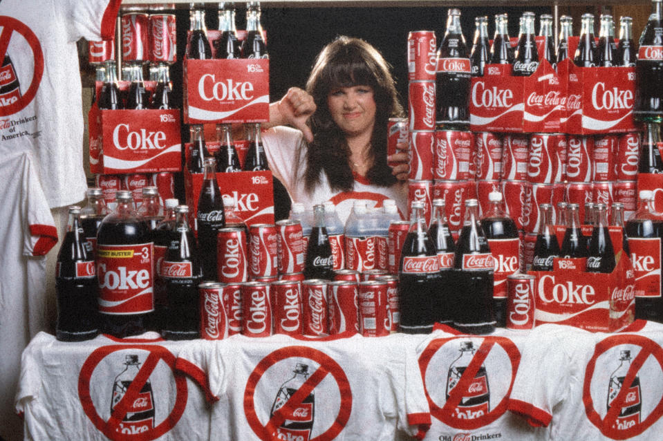 Karen Wilson petitions against the new Coca-Cola formula. (Photo illustration: Yahoo News; photo: Roger Ressmeyer/Corbis/VCG via Getty Images)