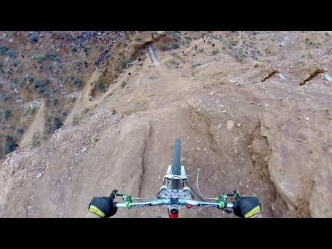 <p>At the 2013 Red Bull Rampage, Kelly McGarry strapped on a GoPro and did a backflip over a 72-foot canyon gap. </p><p><a href="https://www.youtube.com/watch?v=x76VEPXYaI0  " rel="nofollow noopener" target="_blank" data-ylk="slk:See the original post on Youtube;elm:context_link;itc:0;sec:content-canvas" class="link ">See the original post on Youtube</a></p>