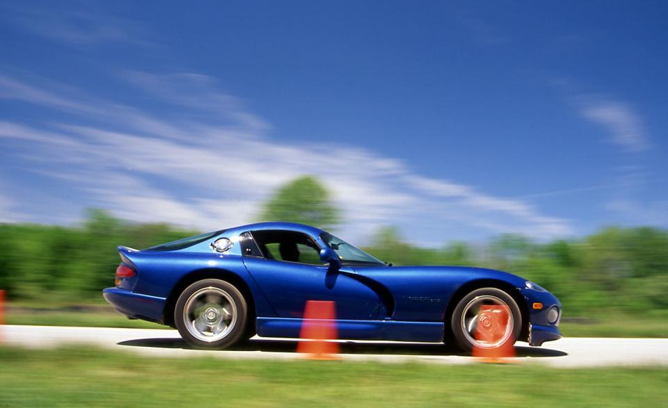 <p><em>September 1997</em></p><p>What We Said: “In choosing our contestants, we selected the best-handling cars we could think of that cost more than $30,000 and represent a broad array of driveline configurations. We arrived at eight contenders. . . . The Viper’s steering is fairly linear but extremely responsive. The Viper achieves 0.90 g with just a quarter-turn of its steering wheel. . . . The 450-horsepower Viper GTS was fastest around the track with an average speed of 93.1 mph, but power couldn’t take all the credit. At each of the three corners we analyzed, the Viper was among the top-three finishers in average lateral acceleration, too. This car felt brutish at Nelson Ledges, with seemingly bottomless reservoirs of power, braking, and grip with which to experiment. . . . Dodge introduced the Viper GTS coupe last year as a ‘touring’ version of the Viper roadster. Don’t be misled. This is a brash, brutal sports car to the core, with the raciest handling this side of a Reynard Indy car.”</p>