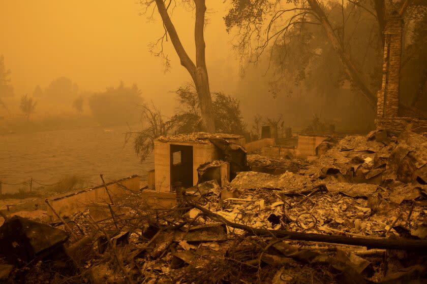 River front property in the community of Klamath River lies in ruins after it burned in the McKinney Fire, in Klamath National Forest, northwest of Yreka, California, on July 31, 2022. - Fueled by drought in a changing climate, the fire grew to over 50,000 acres in less than 48 hours. (Photo by DAVID MCNEW / AFP) (Photo by DAVID MCNEW/AFP via Getty Images)