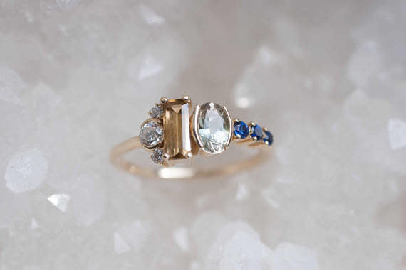 <a href="https://www.etsy.com/listing/527908301/citrine-sunstone-diamond-sapphire?ref=related-7" target="_blank">Citrine, Sunstone, Diamond and Sapphire Cluster Engagement Ring</a>, Mineralogy Design