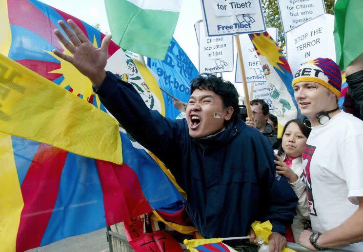 Free Tibet campaigners protesting outside Downing Street (PA)