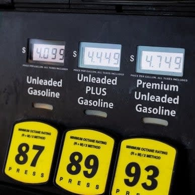 Gasoline prices displayed at a pump for Diesel, Unleaded, Unleaded Plus, and Premium Unleaded Gasoline. Prices are $4.039, $4.449, and $4.749 respectively