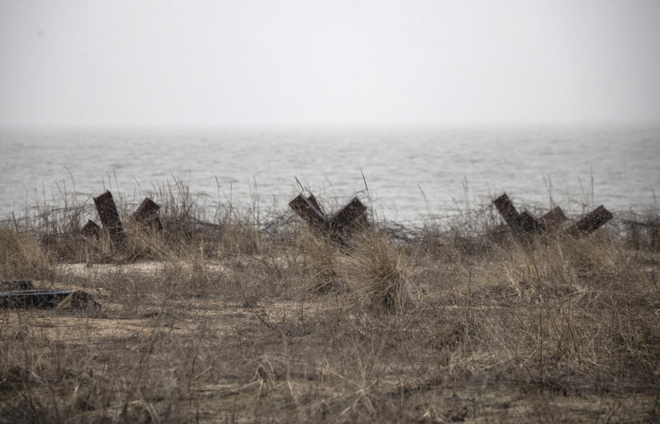 Anti-tank equipment with the Sea of Azov in the background close to the line of separation from pro-Russian rebels, near Mariupol, Donetsk region, Ukraine, Friday, Jan. 21, 2022. Blinken said the U.S. would be open to a meeting between Putin and U.S. President Joe Biden, if it would be “useful and productive.” The two have met once in person in Geneva and have had several virtual conversations on Ukraine that have proven largely inconclusive. Washington and its allies have repeatedly promised consequences such as biting economic sanctions against Russia — though not military action — if it invades. (AP Photo/Andriy Dubchak)