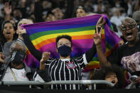 Fans of Corinthians cheer prior to a Sao Paulo championship Women's soccer final match against Sao Paulo at Neo Quimica arena in Sao Paulo, Brazil, Wednesday, Dec. 8, 2021. (AP Photo/Andre Penner)