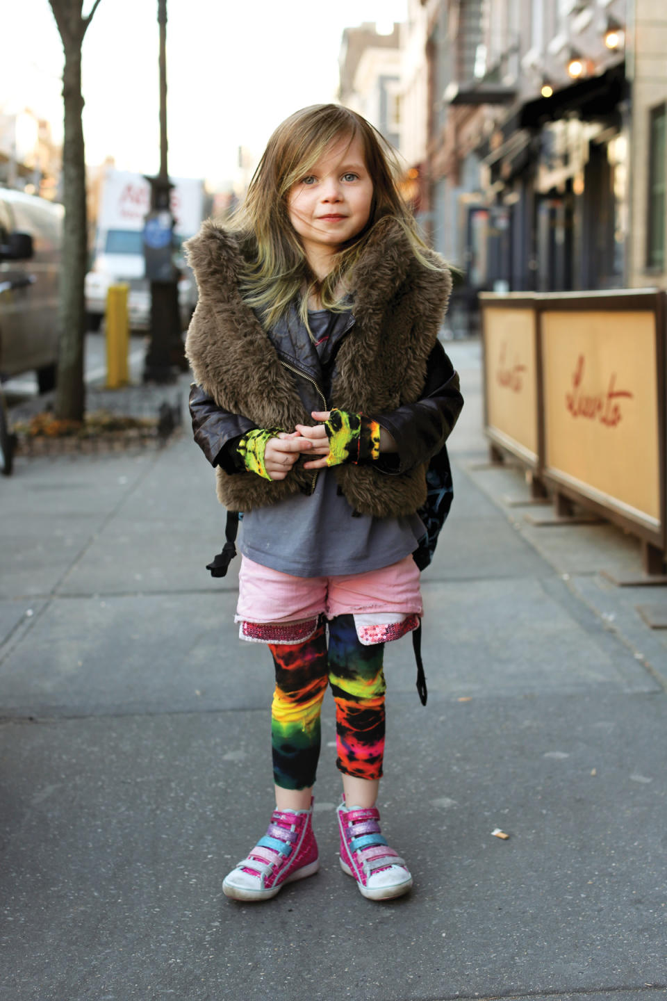 This image released by St. Martin's Press shows a portrait of a young girl in New York. The image is one of many by photographer Brandon Stanton, creator of the blog and book titled, "Humans of New York." Stanton’s magical blend of portraits and poignant, pithy storytelling has earned HONY more than 2 million followers online. His book will be released on Oct. 15. (AP Photo/St. Martin's Press, Brandon Stanton)